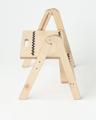 Wooden step stool with anti slip design on a white background