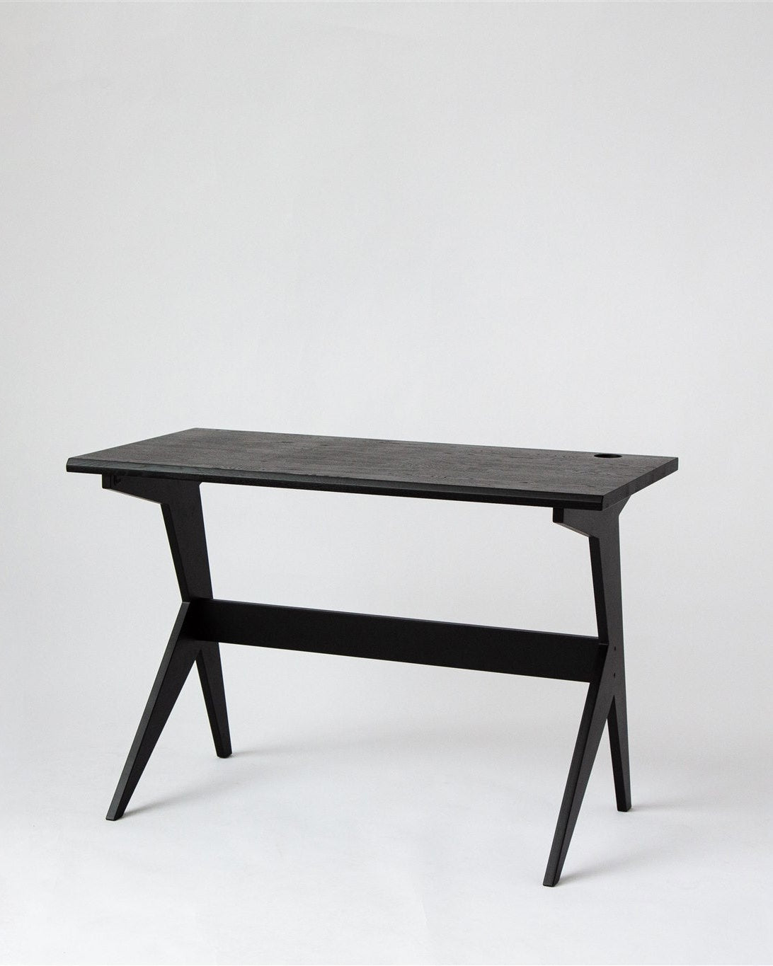 Black wooden table on a white background