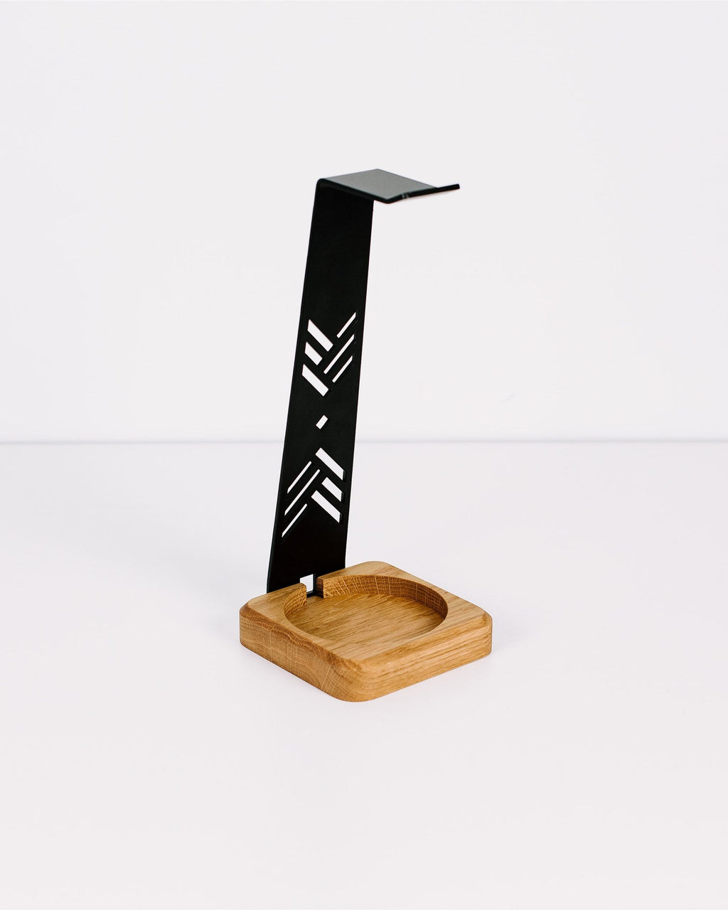 Black metal and wooden stand on a white background