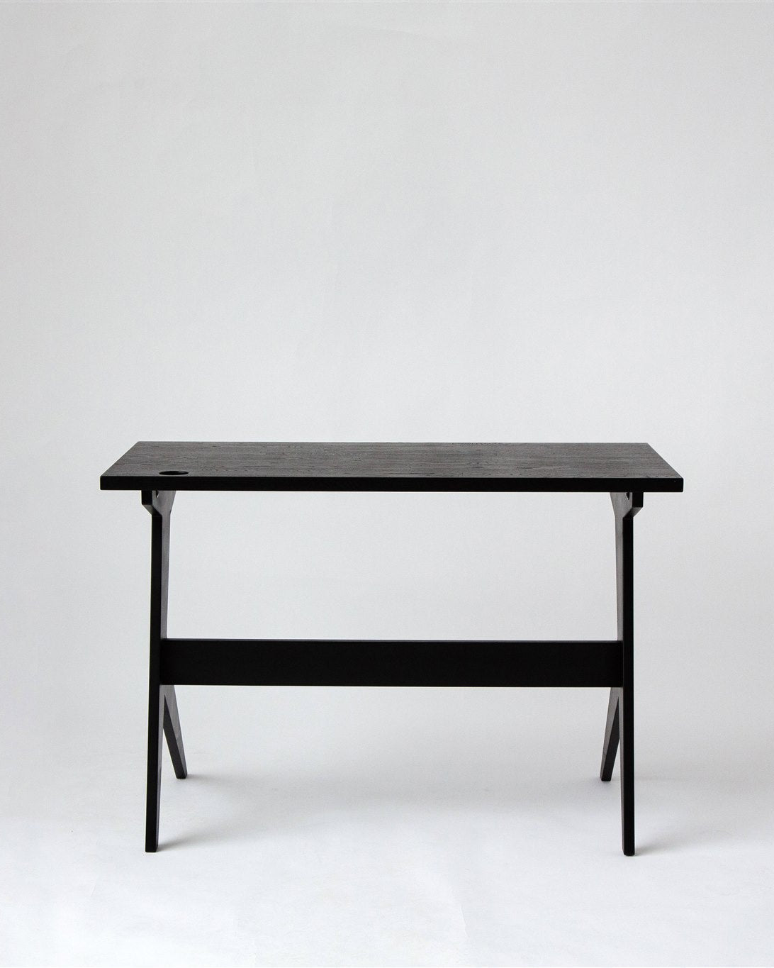 Black desk on a white background